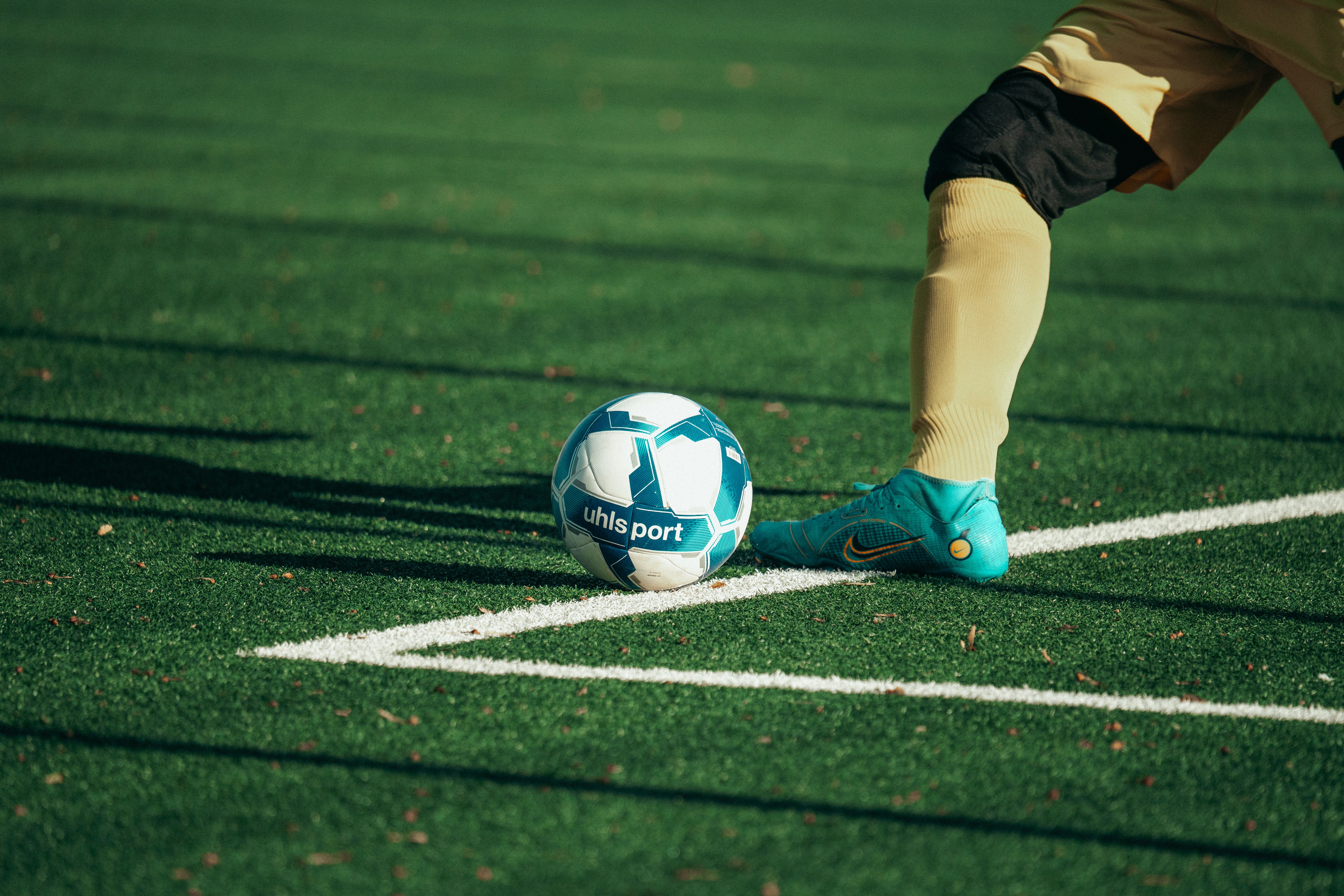 Football placed on the corner arc before a set piece